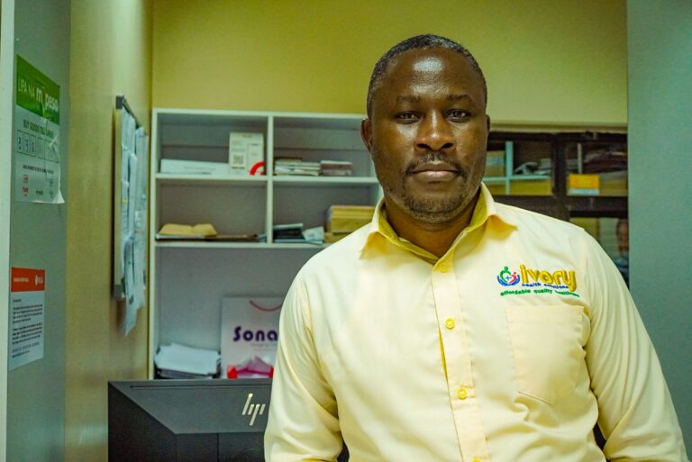 a man in a yellow shirt