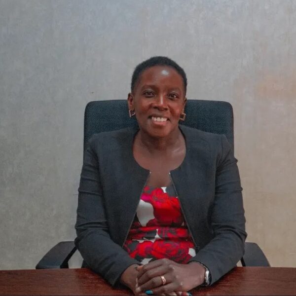 a woman sitting at a desk