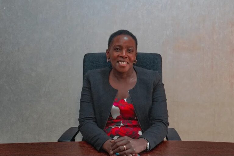 a woman sitting at a desk
