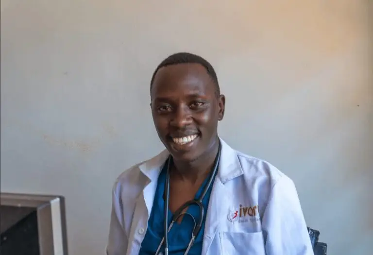 a man in a white coat